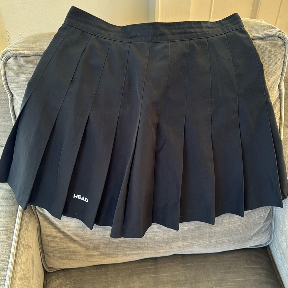 Head tennis skirt. Zip and button closure
